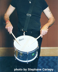The sticks are held match grip.